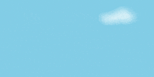 a blue balloon with yellow stars on it in the sky