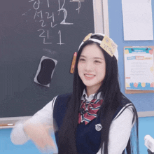a girl wearing a headband with a note on it that says snp on it