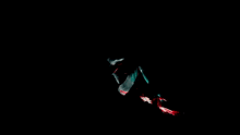 a person in a superhero costume is kicking in the air