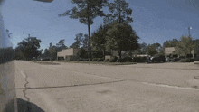 a parking lot with an arrow pointing to a handicapped parking spot