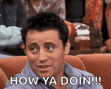a man is sitting on a couch with the words `` how ya doin !!! '' written on his face .