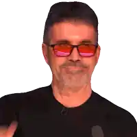 a man wearing sunglasses and a black shirt is giving a thumbs up