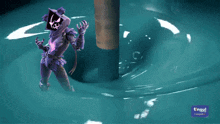 a person in a purple outfit is standing in a pool of water with a tnsul logo in the corner
