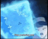 a cartoon character says stop pestering me in front of a blue object