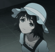 a girl wearing a white hat and a blue shirt looks up