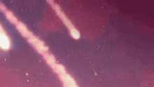 a comet is flying through a purple and pink sky .