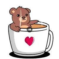 a brown teddy bear is sitting in a cup of coffee