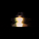 a blurred image of a person with a crown on it