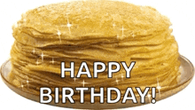 a stack of pancakes on a plate with the words happy birthday