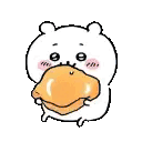 a hamster is eating a piece of bread .