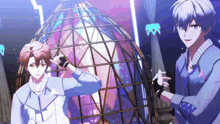 a couple of anime characters standing next to each other in front of a large structure