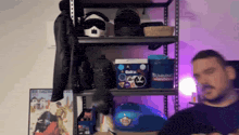 a man standing in front of a shelf with a sticker on it that says bunny