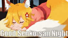 a fox girl is laying on a bed with the words good senko-san night