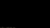 the letter b is on a black object in a dark room