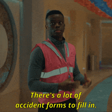 a man in a pink vest says " there 's a lot of accident forms to fill in .. "
