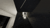 a person is walking down a set of stairs in a video game