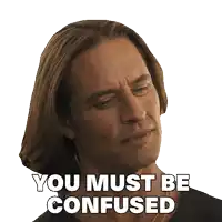 a man with long hair has a sticker that says you must be confused