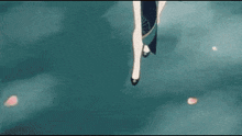 a person is playing a guitar in a video game while standing in the water .