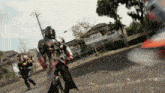a blurred image of a man in a robot costume walking down a street