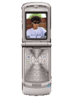a motorola flip phone displays a picture of a man
