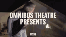 an advertisement for the omnibus theatre presents a man in a dark room