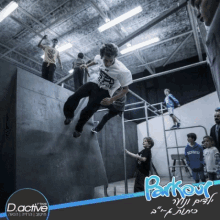 a poster for parkour shows a man jumping off a wall