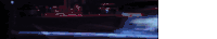 a blurry picture of a city street at night