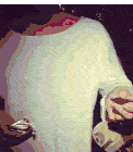 a man in a white shirt is holding a piece of paper with the word jesus on it