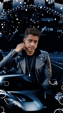 a man in a leather jacket is sitting in a car with the word once on the background