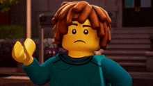 a close up of a lego character with a backpack pointing at something