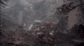 two men are sitting in a pile of bricks with a brick that has the number 8 on it