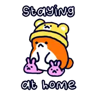 a cartoon of a bear wearing a yellow hat and pink bunny slippers with the words staying at home below it