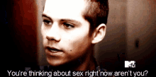 a close up of a man 's face with a question about sex