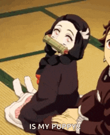 a girl is sitting on the floor with a man holding her .