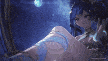 a girl with blue hair is sitting in a chair