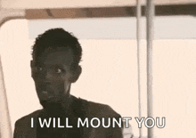 a man is saying `` i will mount you '' while looking at the camera .