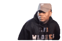 a man wearing a hat and a hoodie that says selamat on it