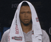 a man with a towel wrapped around his head that says bodyarmor