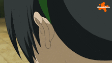 a close up of a person 's ear with the nickelodeon logo in the corner
