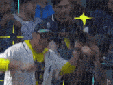 a man wearing a white shirt with the number 15 on it