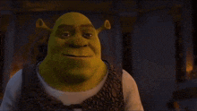 shrek is holding a golden object and the words a mao do ban chega a brilhar are visible