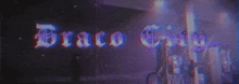 a sign that says draco city on it in purple