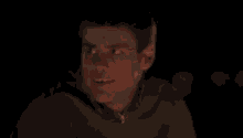 a man in a green sweater is making a funny face in a dark room .