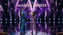 The Masked Singer High Five GIF - The Masked Singer High Five Donny Osmond GIFs