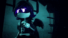 a purple light is shining on a dark background