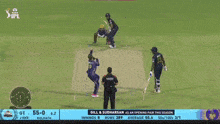 a cricket game is being played in front of an ad for curvy suv coupe