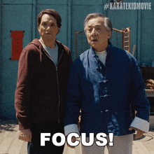 two men standing next to each other with the word focus on the bottom right