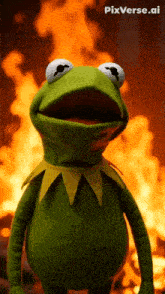 kermit the frog standing in front of a fire with pixverse.ai written on the bottom right