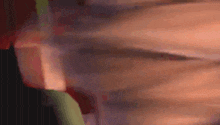 a close up of a person 's torso with a blurred background
