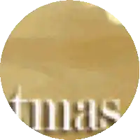 a gold circle with the word christmas written in white letters